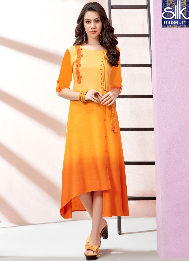 13996 Lovely Orange And Mustard Color Rayon Fabric Designer Party Wear Kurti