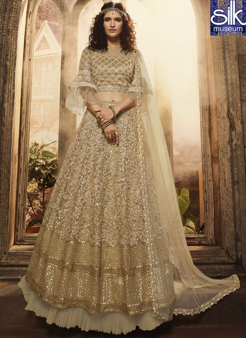 Lovely Beige Color Soft Net Designer Wedding Wear A Line Lehenga Choli