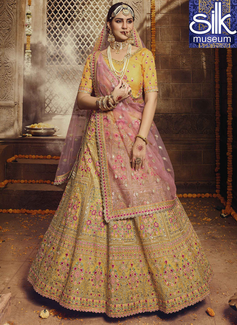 14366 Multi Thread Work In Yellow Color Organza Designer Lehenga Choli