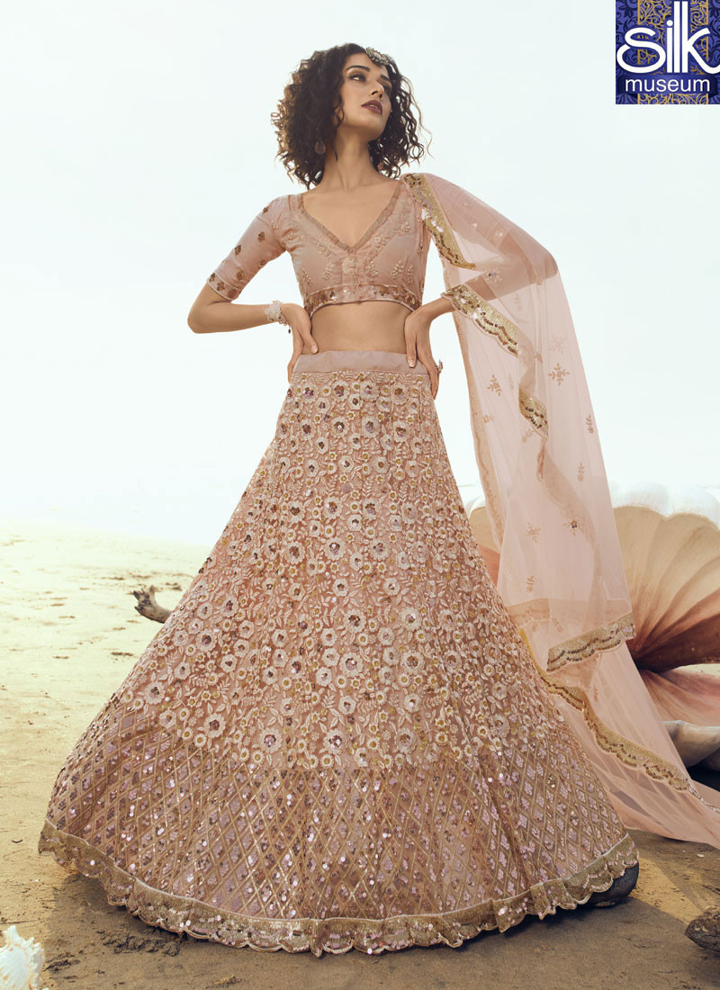14502 Superb Peach Color Soft Net New Designer Party Wear Lehenga Choli