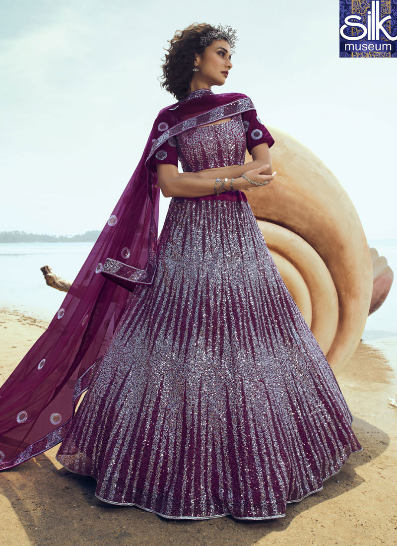 14505 Remarkable Wine Color Soft Net Designer Party Wear Lehenga Choli