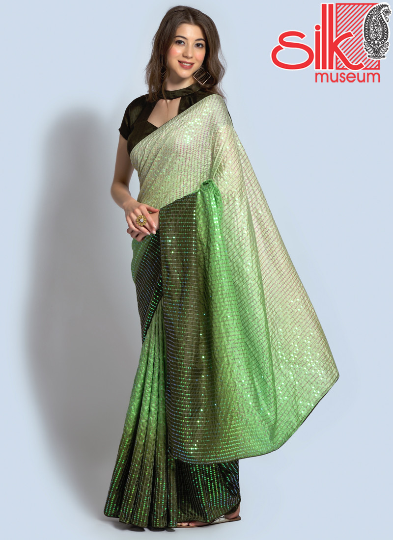 14794 Pista Green Georgette Embellished Saree With Blouse Piece