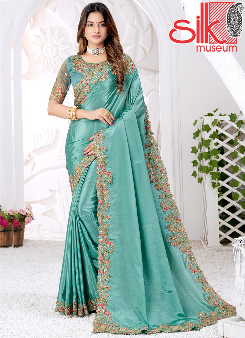 15002 Turquoise Silk Crap Saree With Weaving Zari & Embroidery Work