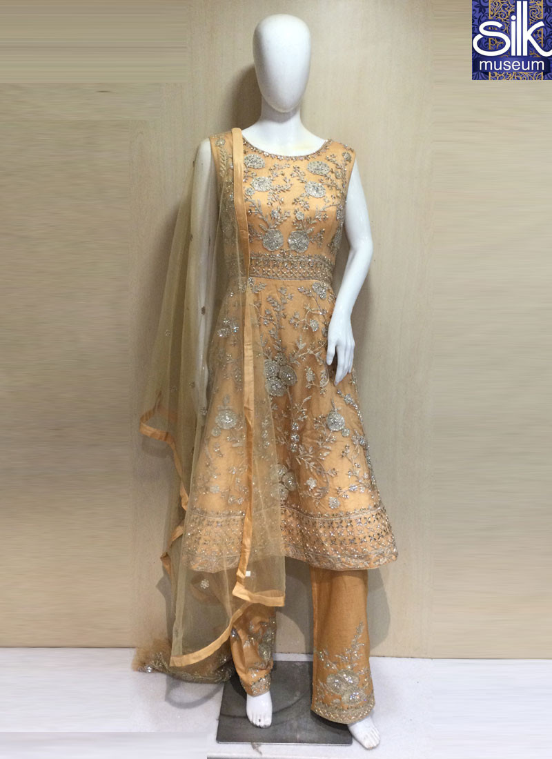 Adorable Gold Color Silk With Net New Designer Peplum Pant Suit