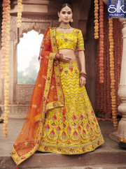 Outstanding Yellow Color Silk Designer Wedding Wear A Line Lehenga Choli