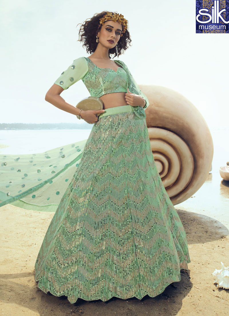 Stunning Green Color Soft Net New Designer Party Wear Lehenga Choli