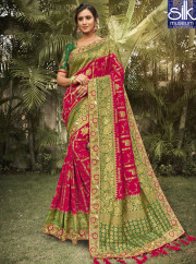 Wondrous Reddish Pink Color With Green Touch Silk Designer Wedding Wear Saree