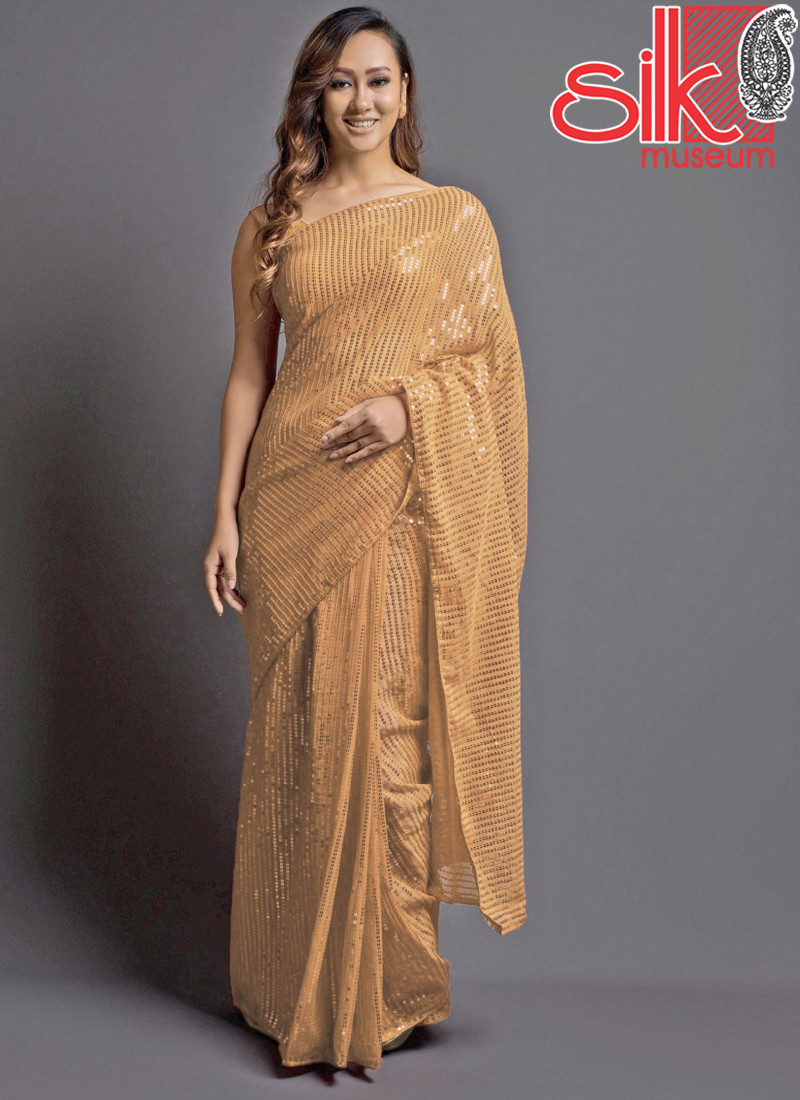 Gold Georgette Embellished Saree With Blouse Piece
