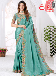 Turquoise Silk Crap Saree With Weaving Zari & Embroidery Work